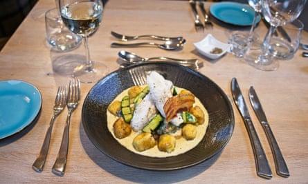 Monkfish Tail with Gnocchi Potato, Wild Mushrooms, Pancetta, White Wine and cream, at the Ginger Peanut