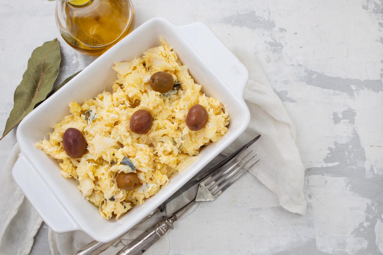 typical portuguese dish eggs with cod fish olives white dish bacalhau lisbonense